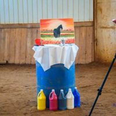 a person standing in front of a blue wall