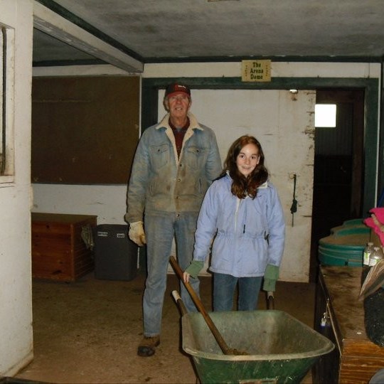 a man and a woman standing in a room