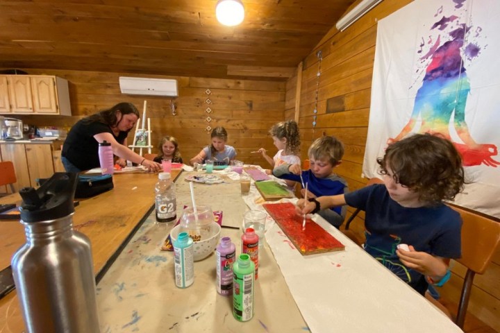 a group of people sitting at a table