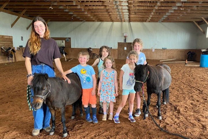 a group of people standing in a room