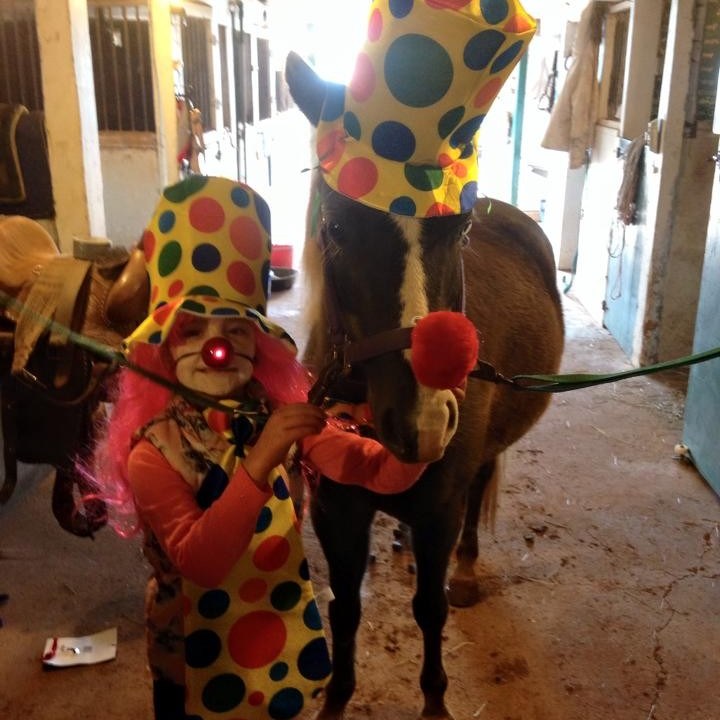 a person holding a stuffed animal