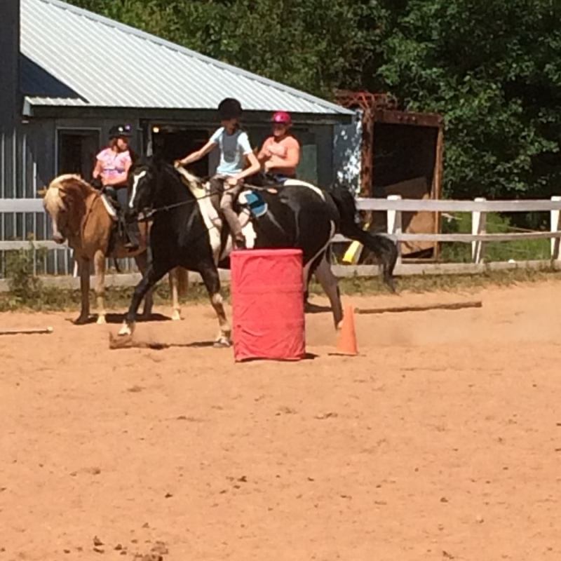 a couple of people that are standing in the sand