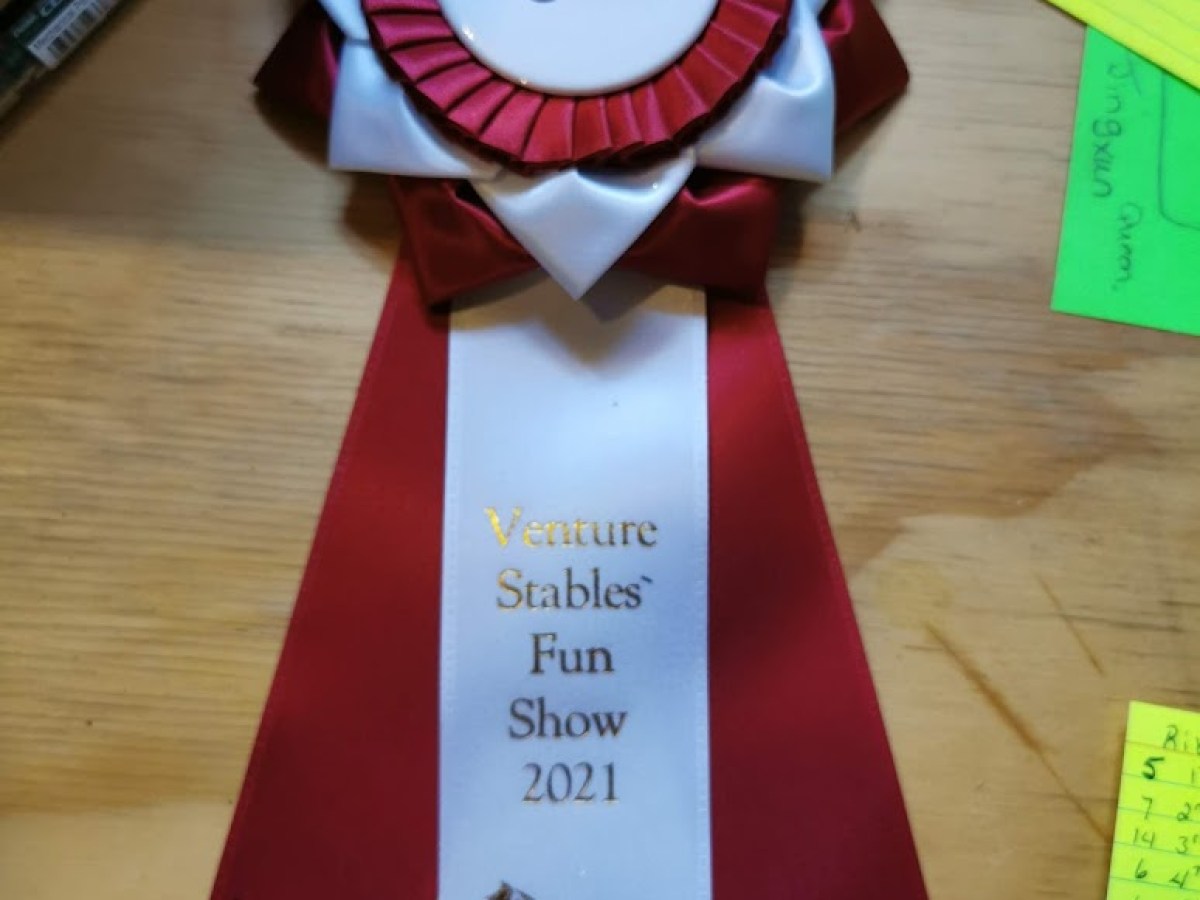 a stack of flyers on a table