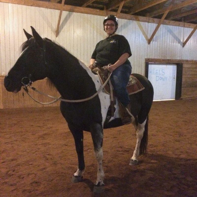 a man riding a horse