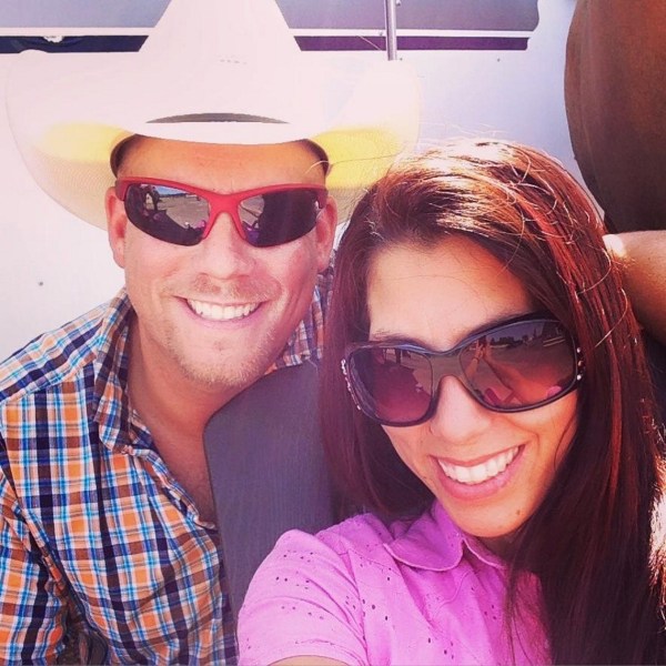 a couple of people that are wearing sunglasses posing for the camera