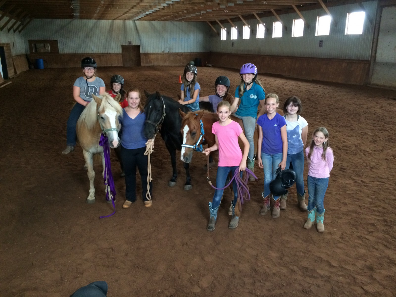 a group of people standing in a room