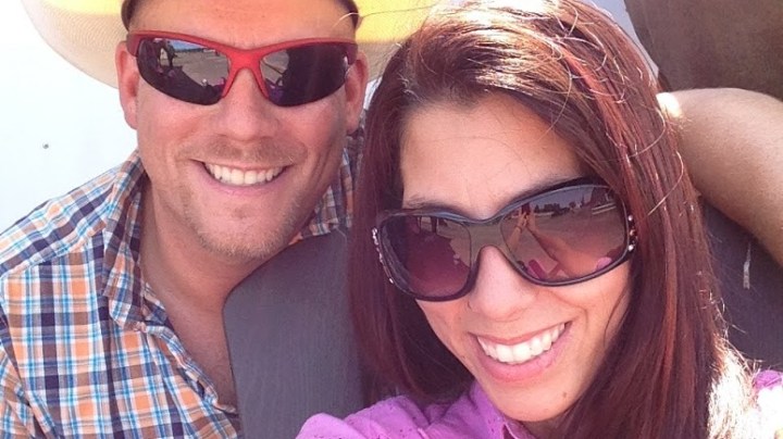 a couple of people posing for the camera